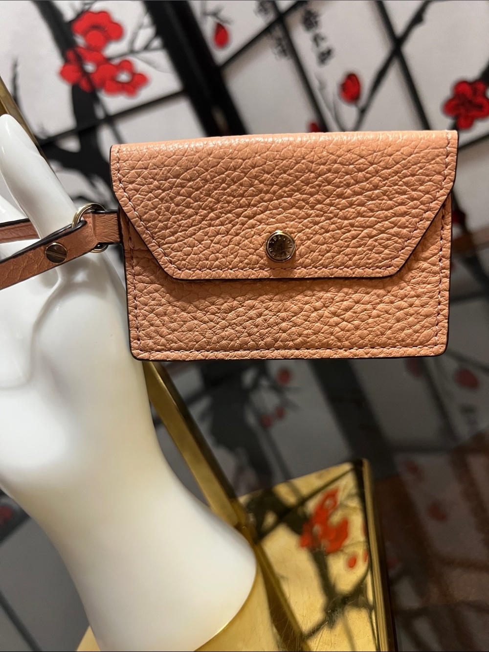 Henri Bendel Pebbled Leather Mini Wristlet in Peach